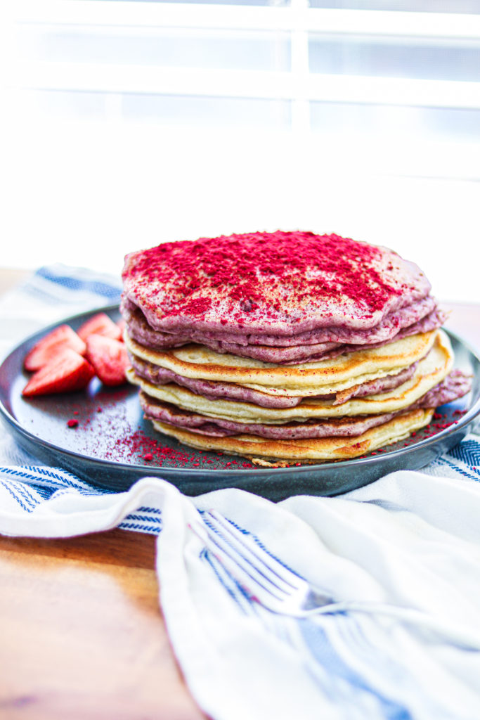 A plate of gluten free raspberry pancakes by Sisters Sans Gluten