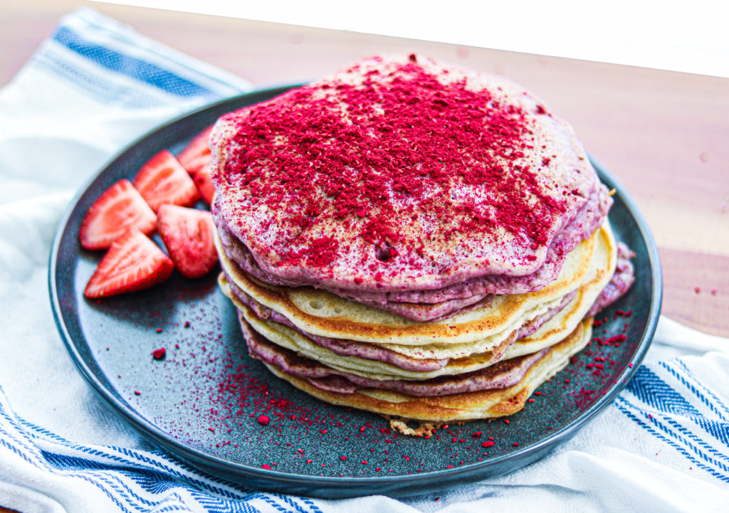 A plate of gluten free raspberry pancakes by Sisters Sans Gluten