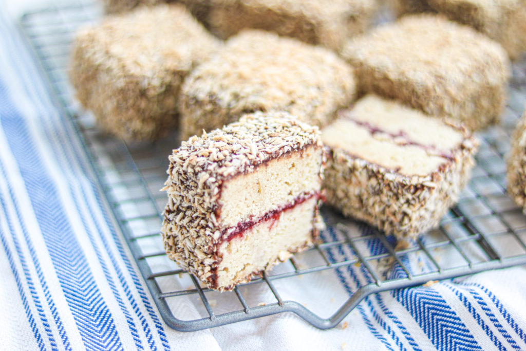 A slice of a gluten free lamington by sisters sans gluten