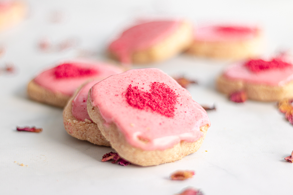 Close up of raspberry glazed gluten free shortbread cookies by Sisters Sans Gluten