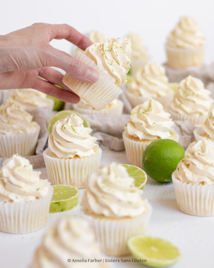 picking up a gluten free coconut lime cupcake by Sisters Sans Gluten